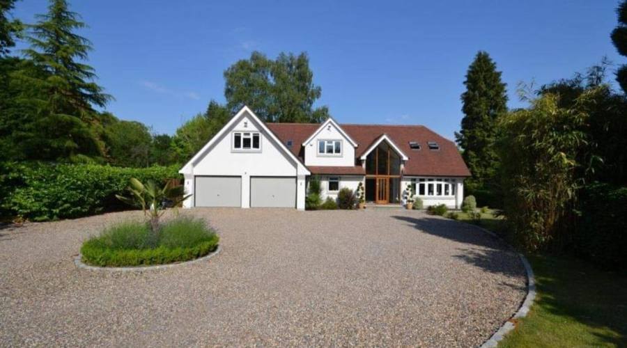 Detached family home renovated by Resolute Build, with double garage and gravel drive