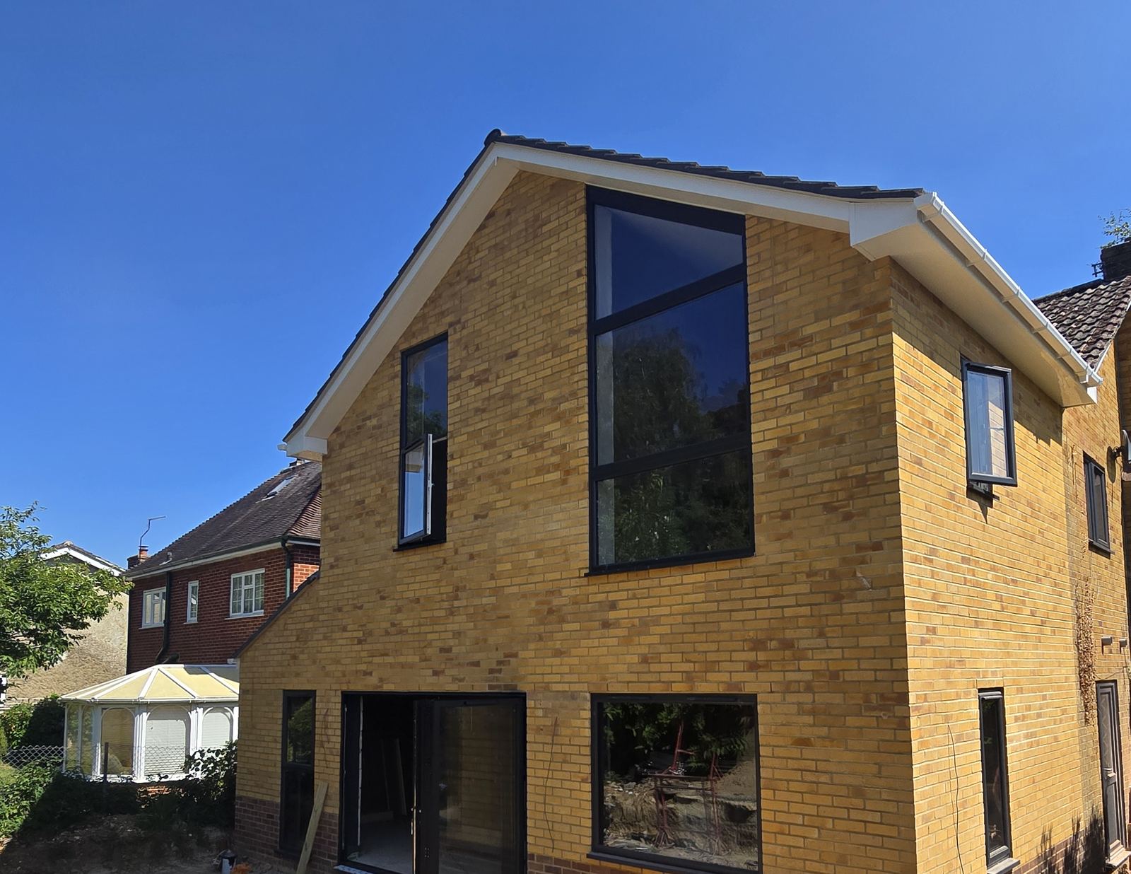 Alton: Double-storey extension with full-height glazing